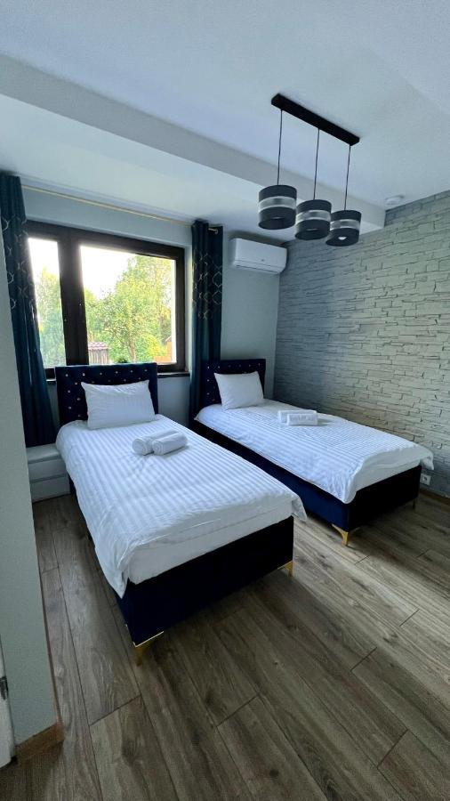 Aparthotel W Dolinie Stawow Zator By Housine Las Exterior foto